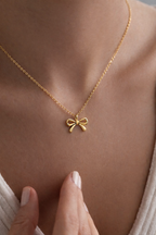 Golden Bow Pendant 🎀