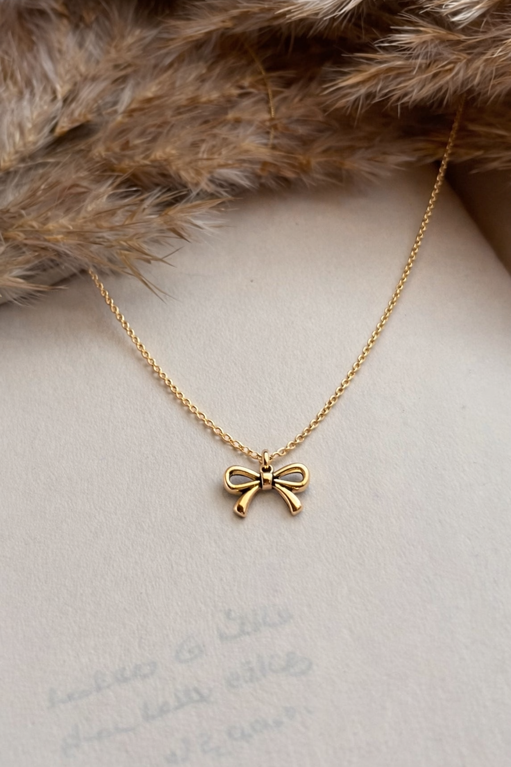 Golden Bow Pendant 🎀